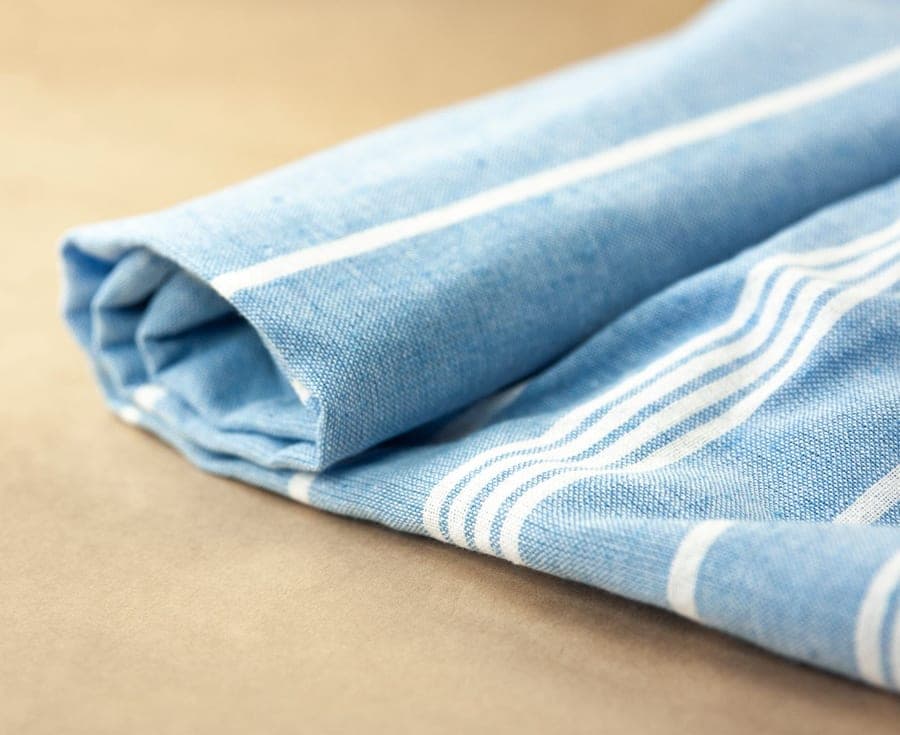 Turkish towel with flat woven face and terry reverse