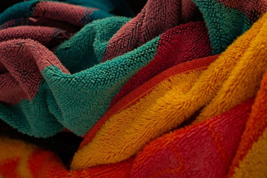 Plush Turkish cotton bathrobe folded on a chair