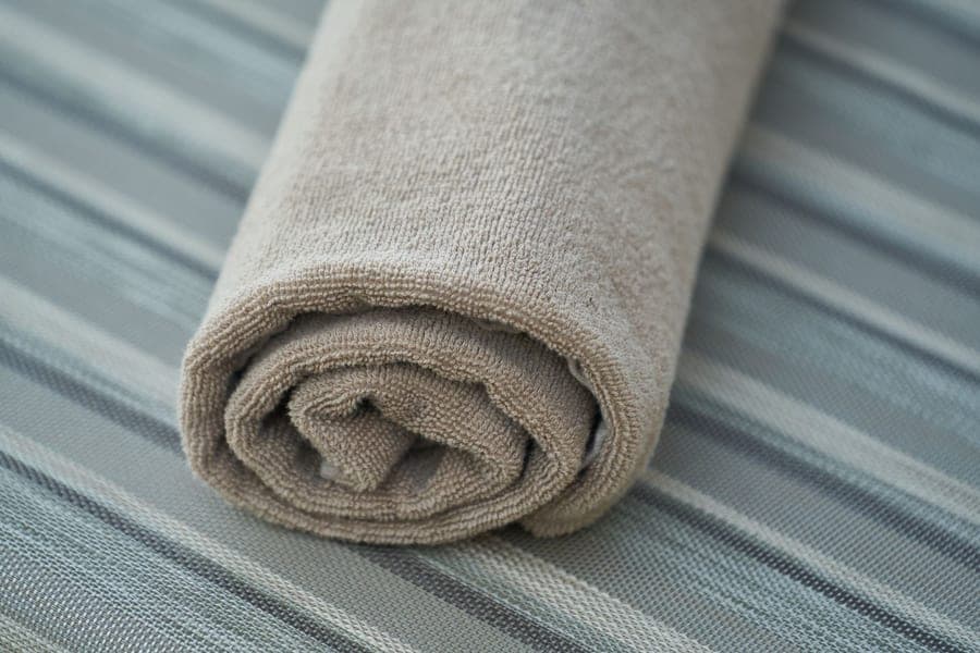 Very thick white cotton bath towel with a dobby border