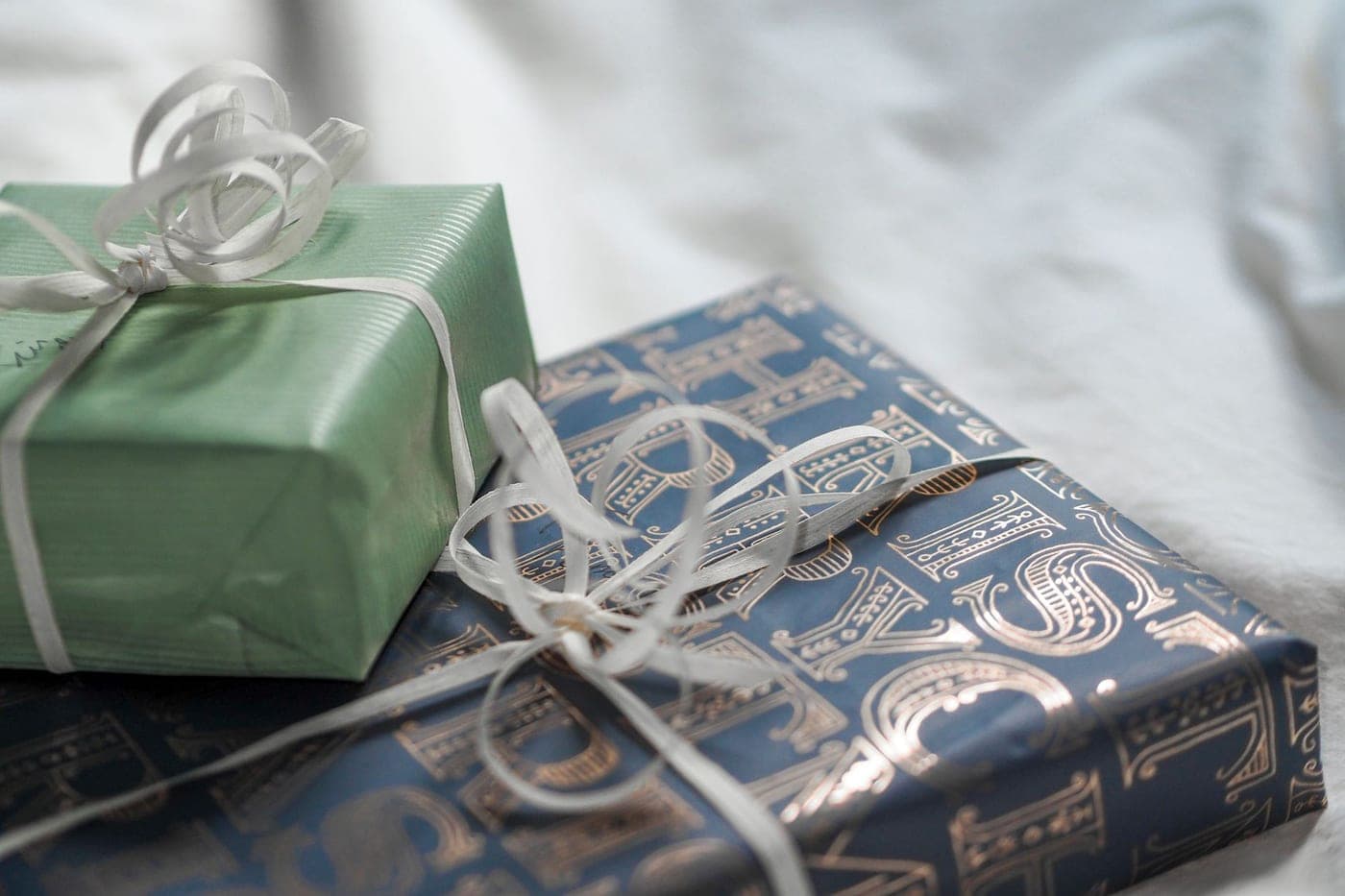 A folded bathrobe presented as a wrapped gift
