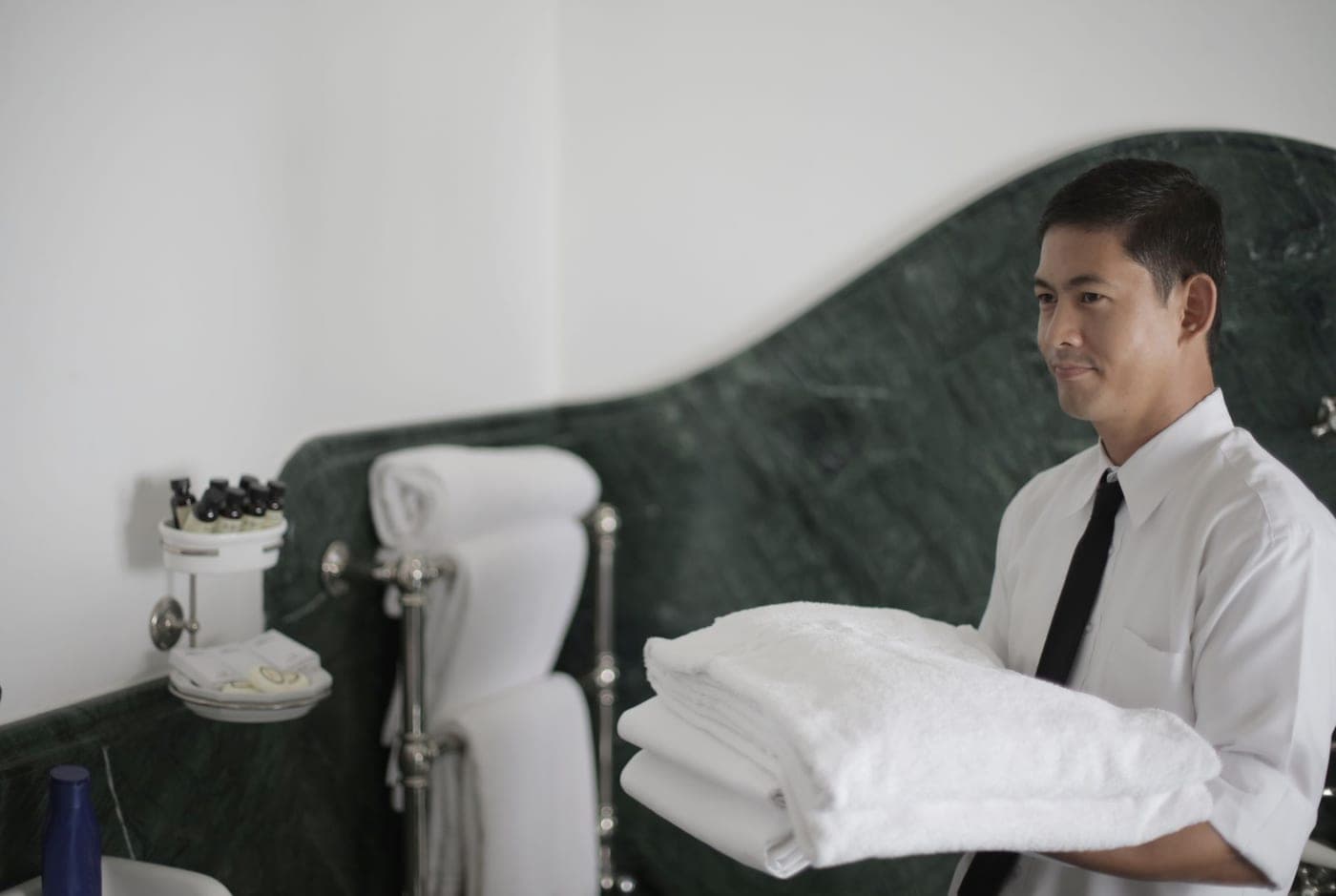 A finely woven luxury cotton bath towel on a marble counter